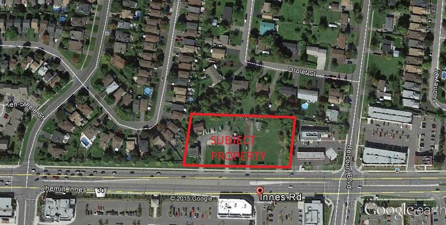 2.2 SURROUNDING USES 5 North Exhibit B - Air Photo, Subject Property Highlighted in Red and Surrounding Area The land north and west of the development site is residential (solely single dwelling