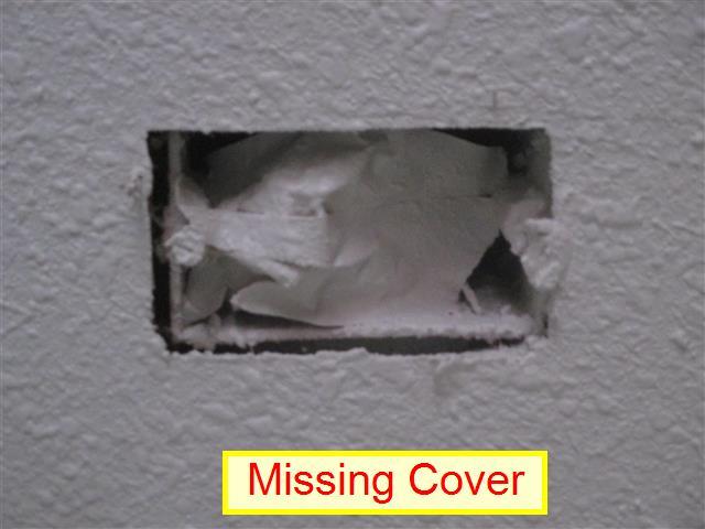(1) Missing J-Box Cover. There was a missing cover for the ceiling J-Box in the entryway. Missing covers expose electrical wires and create a potential shock hazard.