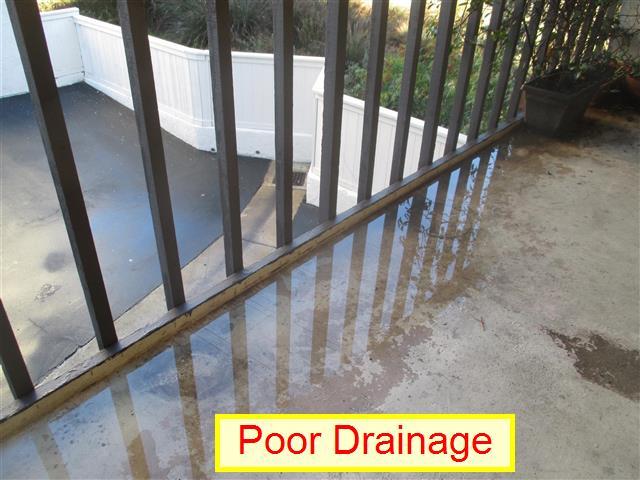 This is a safety measure to help ensure that a child cannot slip through this area. It is recommended that you add a screen or more balusters at this location. (2) Poor Drainage.
