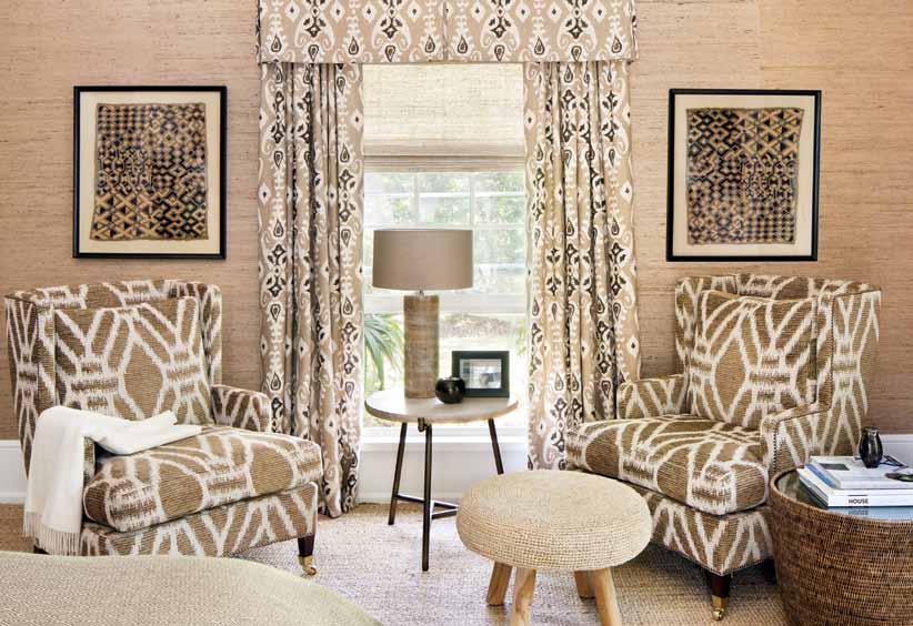 Wallcovering by Phillip Jeffries is the perfect backdrop for Patricia Edwards chairs in Clarence House fabric.