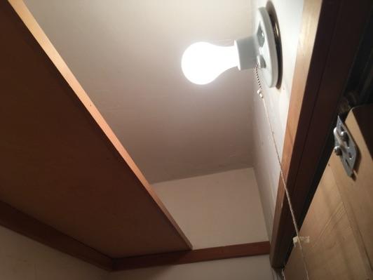 Lights with exposed bulbs in closet/storage areas can be a potential fire hazard if
