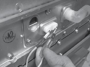 Flame Rod Wire Connector: To remove, pinch flat sides at end with your finger nails, then slide connector off the spade. Figure 55. The wires are locked onto the connectors.