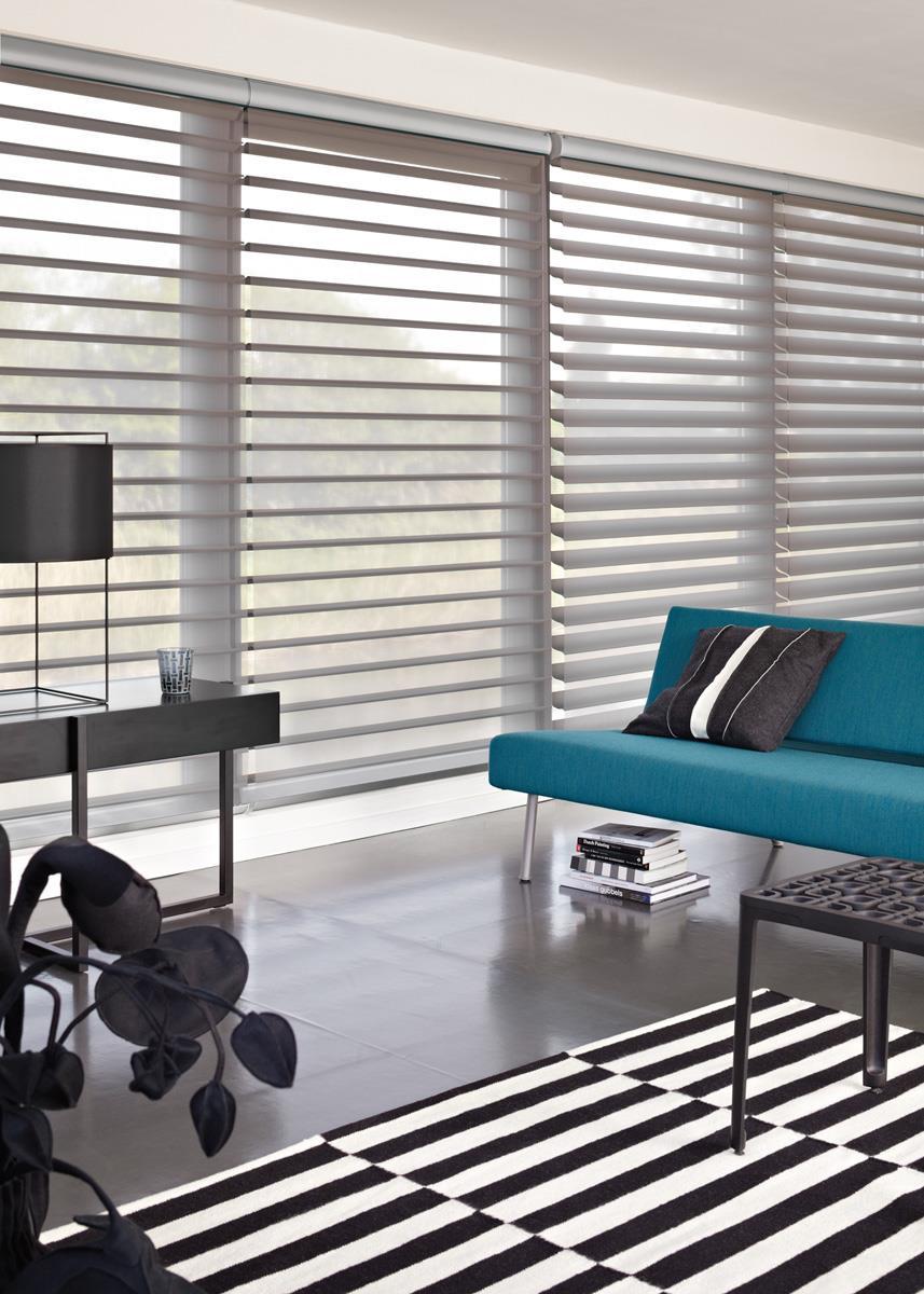 Luxaflex Silhouette Blinds The Luxaflex Silhouette collection has 8 exclusive fabric types, and 4 vane/slat widths 50mm, 63mm, 75mm & 100mm.