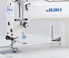The arm configuration is designed to provide a larger sewing space.