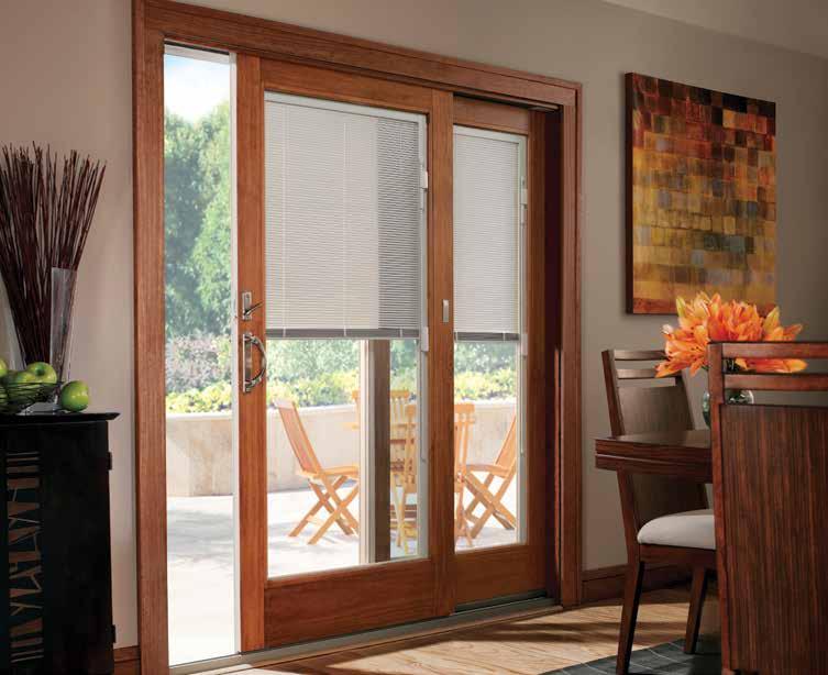 GLIDING PATIO DOORS 400 Series Frenchwood gliding patio door with Newbury hardware in Satin Nickel. Shown with Blinds-Between-the-Glass.