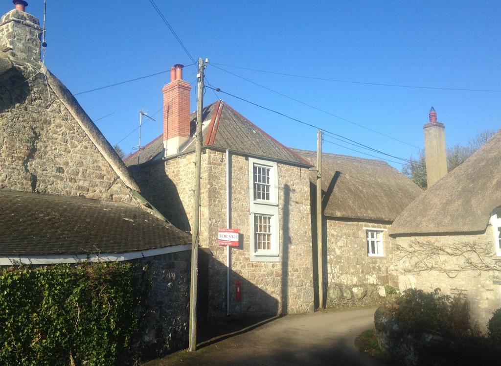 approximately one mile from the centre of Chagford 265,000 Freehold Rendells, Rock