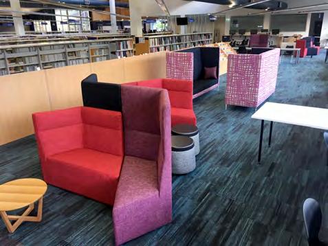 Library high back modular lounging has created workable spaces within the library for the
