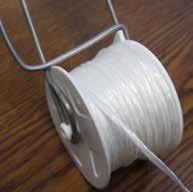 spool between the wire ends of the hanger.