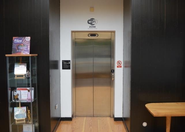 Above: A lift, large enough to accommodate a person using a standard wheelchair and at least one companion, is available to take visitors to The Gateway restaurant on the first floor.