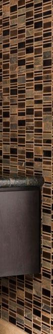 RECLAIMED WOOD For a wall that makes a statement, choose a tile that tells a story.
