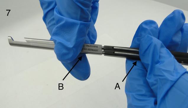 Figure 7 A. Depressing the Tip Release Levers B. Removing the Sharp Kerrison Tips C.
