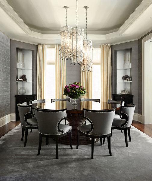 A round table takes center stage in a dining room designed by Joan Craig to make entertaining effortless. Werner Straube "Bench-style seating can be a struggle for dining rooms.