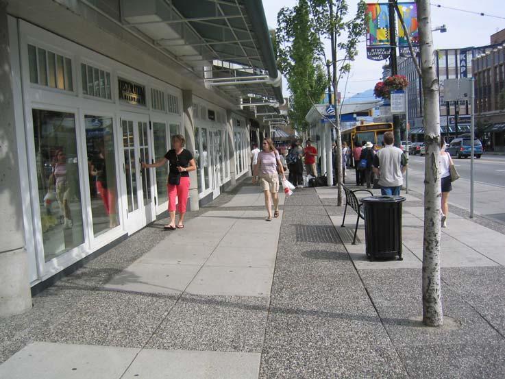 sidewalks with specialty boulevard treatments and street furnishings; Figure 3: