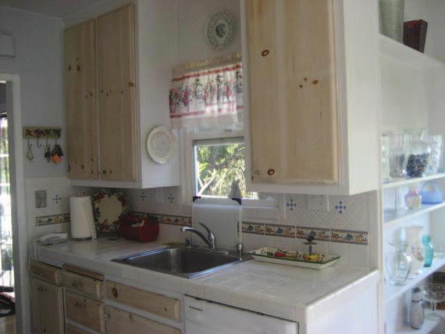 Kitchen: 1. Refinish and paint existing cabinets- Paint Shoji White 2.