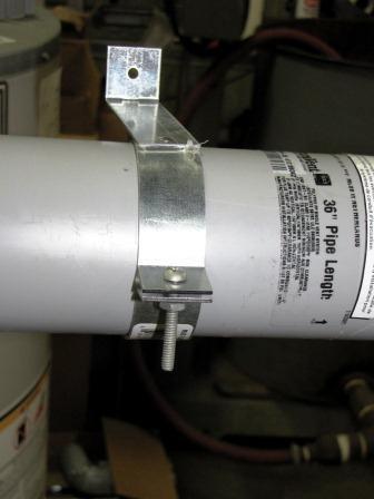 ¼ inch per foot (20 mm per meter) toward the water heater to allow condensate to drain into the condensate elbow.