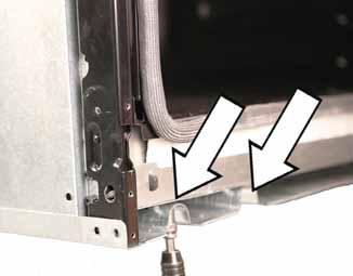 13. Remove the two screws from the bottom of the base pan. Vertical Brace Reinstallation 1.