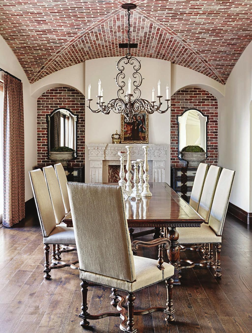Brick lends rich, textural color and Spanish-style substance to a groin-vault ceiling and arched