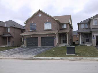 52 City of Vaughan Design Standards Review Photo 23: Garage-dominated house forms