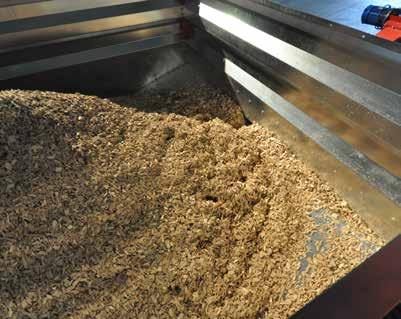 Integrated feed system The wood chip storage is fitted with a powerful rotary agitator on top of the sloping floor.