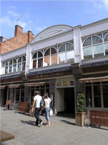 Figure 9 The horizontal emphasis of the Slug and Lettuce building and the row of stained glass windows are common features of Art-Deco style buildings The majority of roofs are gabled with their