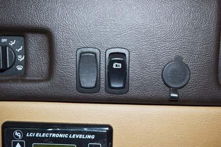 SECTION 3 - DRIVING YOUR MOTORHOME Radio Power Switch (Located on dash) -Typical View Press DOWN to run radio off of the house battery (the ignition key does NOT need to be turned on).