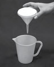 (c) There are still bits of mud in the water. The mud can be separated from the water by filtering. filter paper funnel jug Explain how the filter paper separates the mud and water.