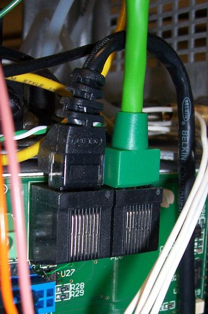 Route and connect the green patch cable from the flow board on Air Server to