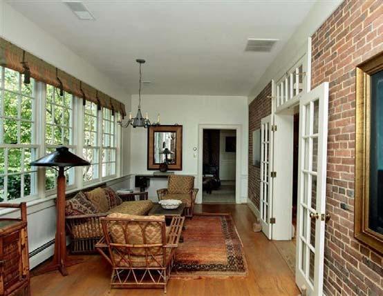 Living Room: Hardwood floor, dentil crown molding, chair rail, chandelier,