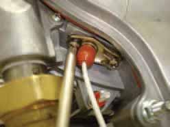 35 Maintenance (continued) Figure 135 2. Remove two (2) Phillips head screws securing the ignition electrode to the boiler heat exchanger. 3.