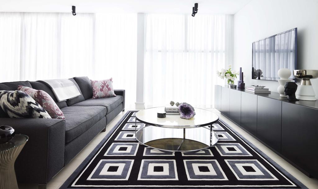 Striking living room The striking patterned rug is from Greg Natale s Lake Como