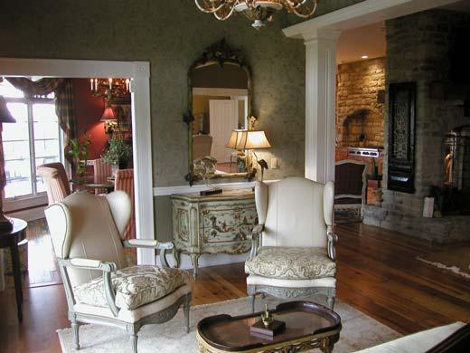 two-sided fireplace with vintage mantel from