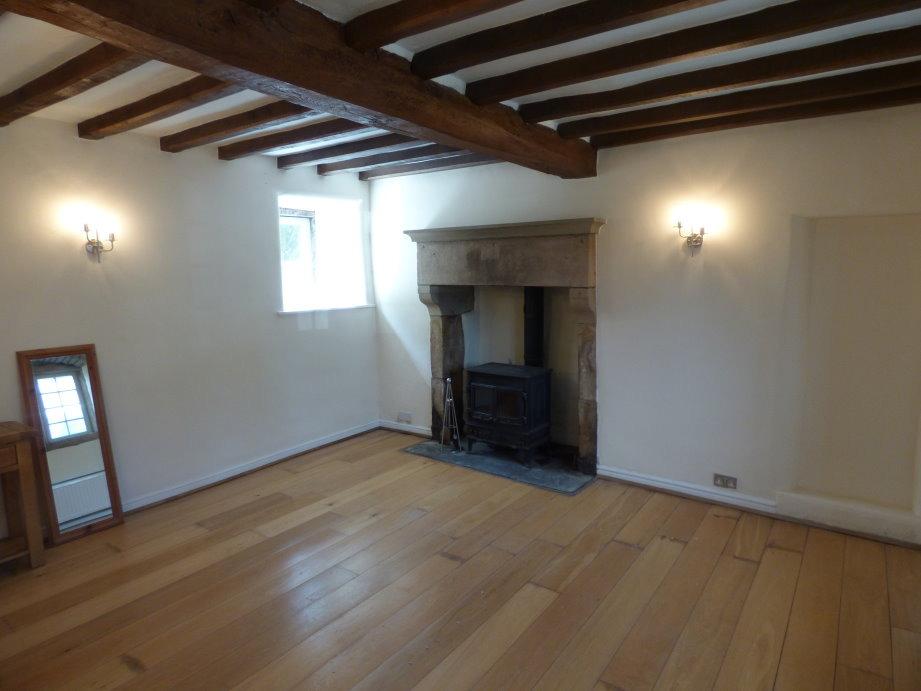 ACCOMMODATION GROUND FLOOR ENTRANCE via footpath and hardwood entrance door into: ENTRANCE HALL with oak beams and smoke alarm to ceiling, having solid oak flooring and double wall light fitment.