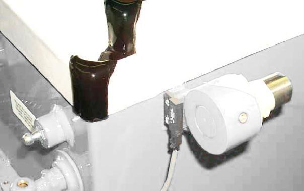 switch PURPOSE: The purpose of the lid safety switch assembly is to shut off the chamber controls when the cover is not closed.