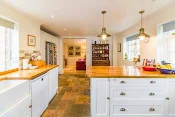 Located in a most attractive mature village setting in delightfully mature and private gardens and grounds, spacious and wellappointed 3 reception room, 4 bedroomed, 2 bathroom traditional