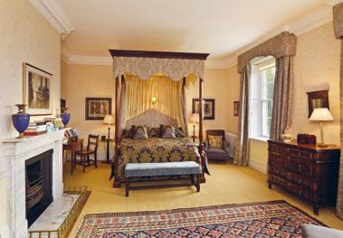The drawing room is a magnificently elegant Georgian room with a fine curved eastern elevation with full height shuttered sash windows.