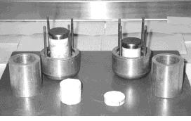 4 SOIL SPECIMEN HOLDERS Two aluminum soil specimen holders were specially designed for use in the J6-HC centrifuge to hold 10 to 15 mm thick soil specimens at different heights.