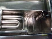 Opens steam valve to send steam to coils