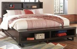 Chestnut finish with saw kerfing Storage headboard can be used with choice of panel or storage footboard Cases have stocky appearance with mitered framed bodies and metal legs Dovetailed drawers have