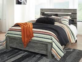 B227 Cazenfeld Contemporary group with an uptown look and a down-to-earth sensibility Rustic gray finish over replicated oak grain inspired by weathered barn wood Headboard designed with an open slat