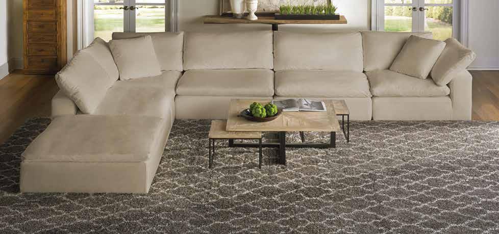 5 inches deep, with cushions wrapped in luxury goose down. 100% pure cotton slipcover in soft, versatile taupe.