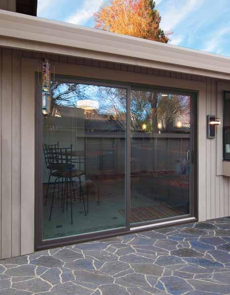sliding patio door. Some doors shown with optional grids and hardware. The Contemporary Patio Door boasts a sleek, streamlined profile.