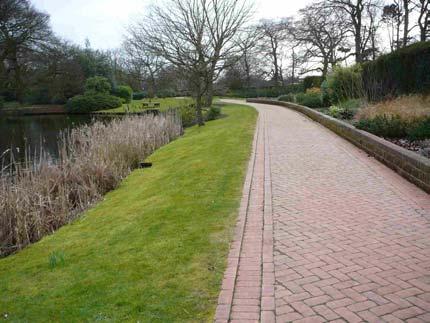 At both ends it links with a footpath/cycleway which runs around the outside of the Garden wall.