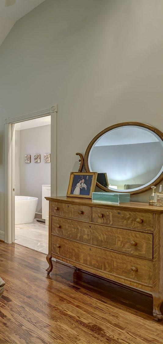 In the master bedroom, the enlarged opening to the bathroom makes the space in both rooms seem larger.