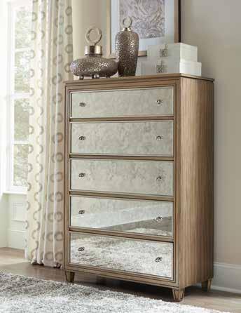 The vanity features behind-the-mirror jewelry hooks, drawer storage, tri-fold mirror and a glass shelf that connects the drawer units.