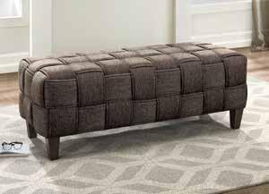 Covered in a deep gray tone fabric for a versatile personal decorative touch, while button tufting and