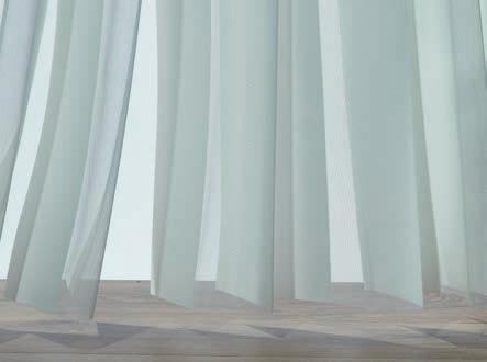Simply turn the fabric vanes for sheer light control or total privacy.