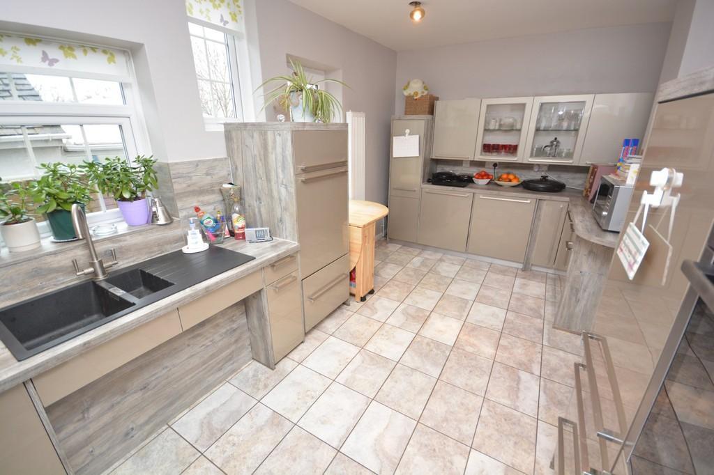 FIRST FLOOR LANDING Central heating radiator, smooth finish walls, built in linen cupboard with slatted shelves, upvc double glazed windows to rear offering far reaching