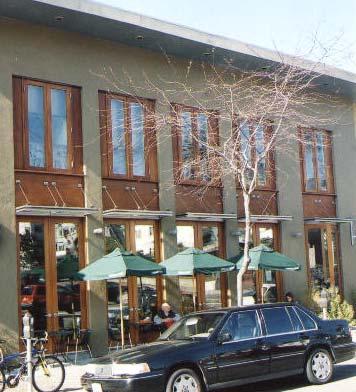 2.4.8 Commercial clerestory and transom windows are recommended to provide a continuous horizontal band or row of windows across the upper portion of the storefront. 2.4.9 Decorative treatments on windows or balconies are recommended if consistent with the building style.
