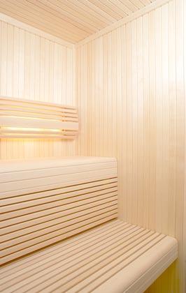 concealing sauna lighting all in elegant, slender strips of wood.