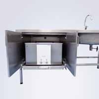for storing of ultrasonic units up to 28 liters, for fitting on a Getinge stainless steel worktable to give more free worktop space.